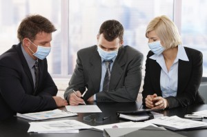Business people fearing h1n1 virus